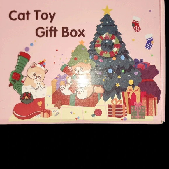 Cat Christmas Toy. LOTS OF LITTLE BALLS AND A GUN TO shoot the ball for fetching - Picture 1 of 3